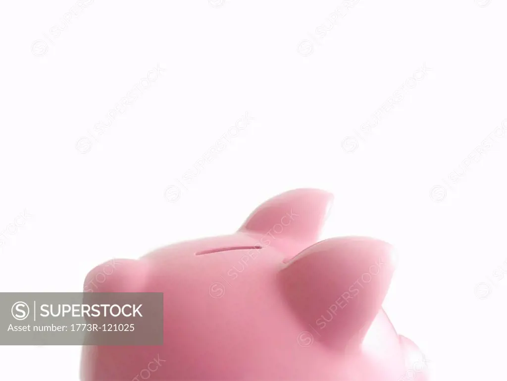 Piggy bank against white