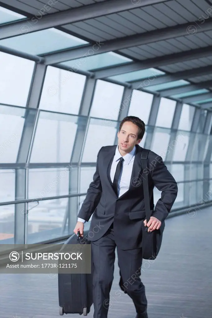 businessman with case hurrying