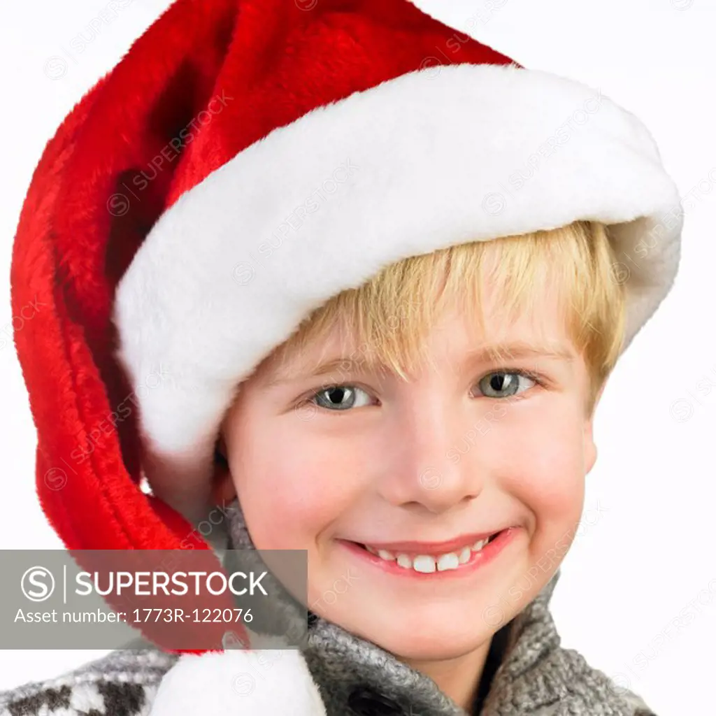 Boy wearing a christmas hat