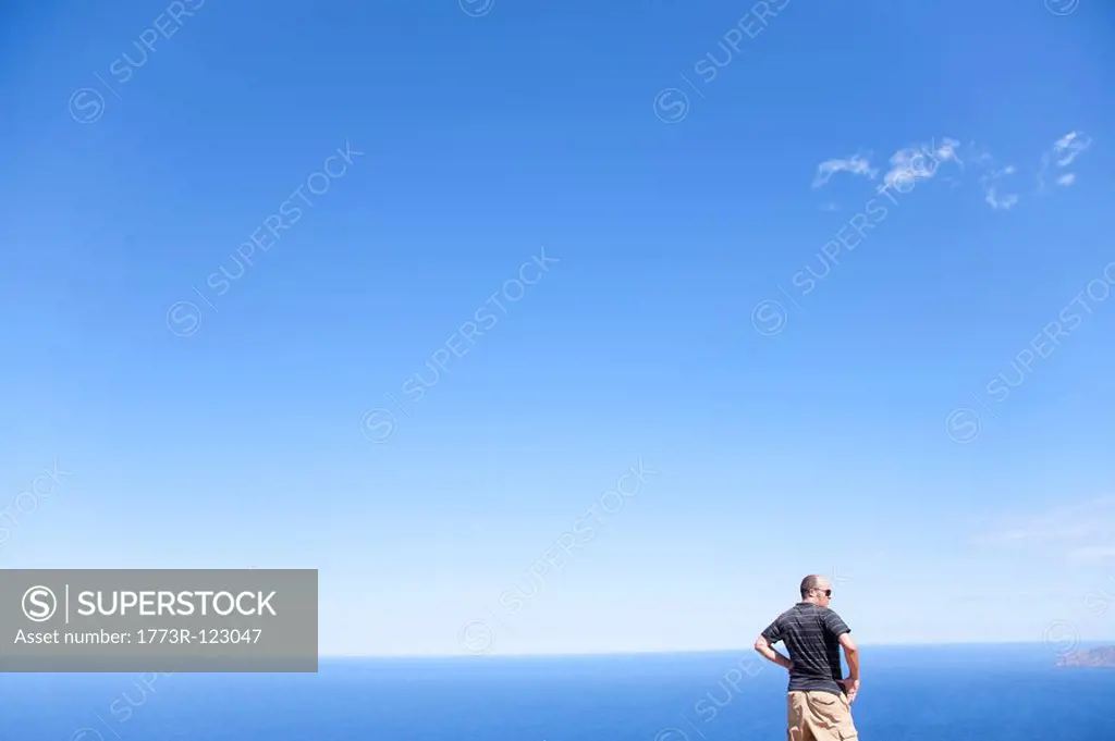 Man in front of ocean