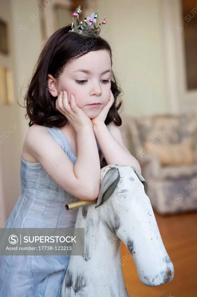 girl resting her head on her hands