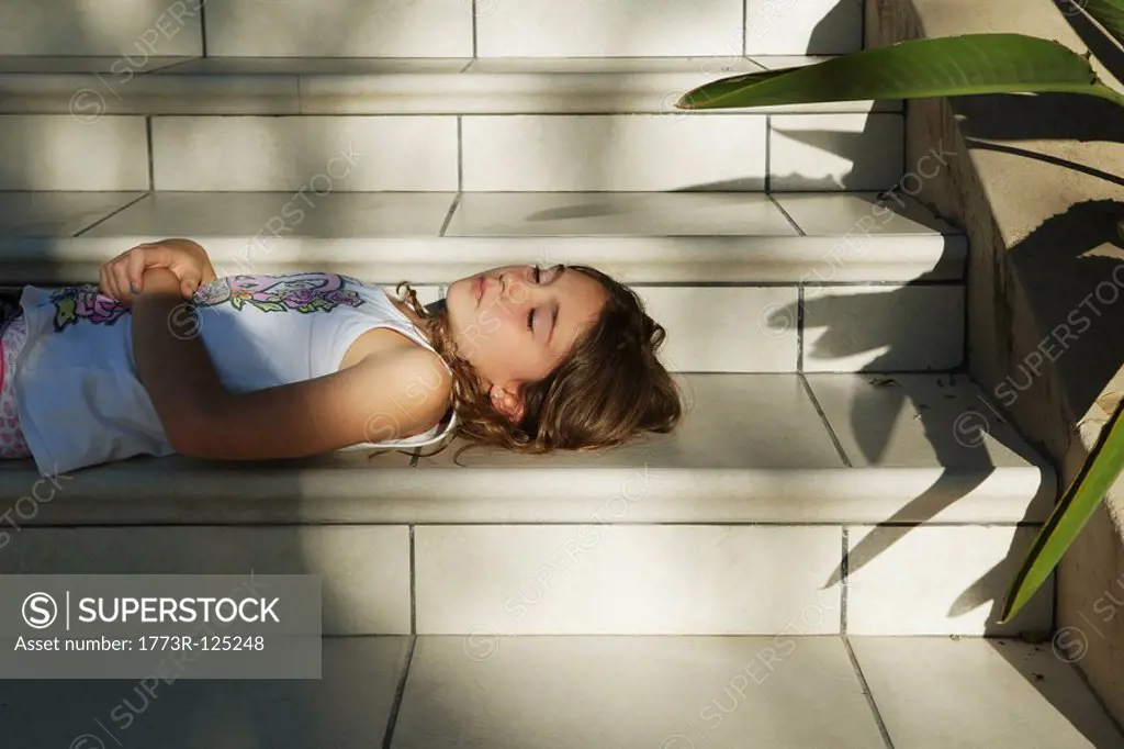Girl relaxing on steps