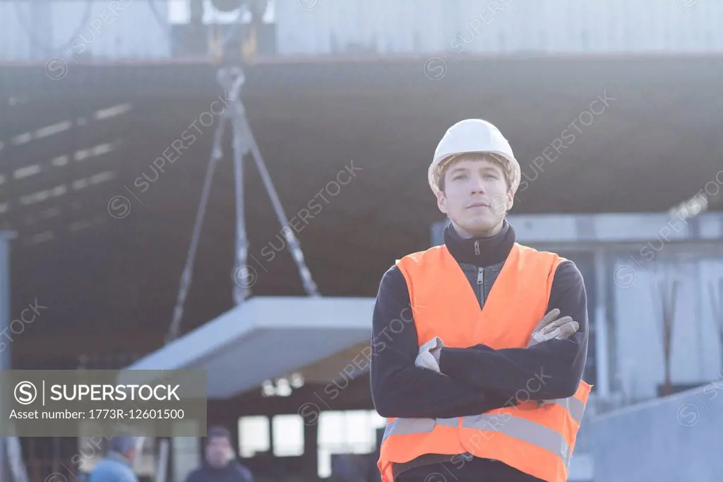 Portrait of factory worker outside concrete reinforcement factory