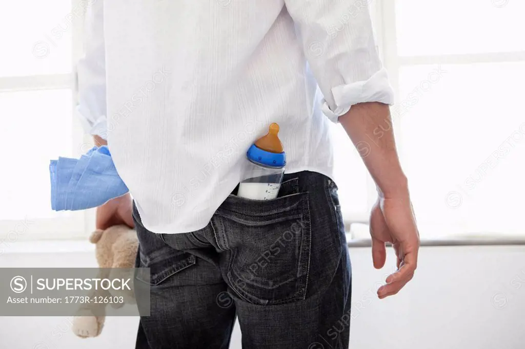 Man having baby_things in his pockets