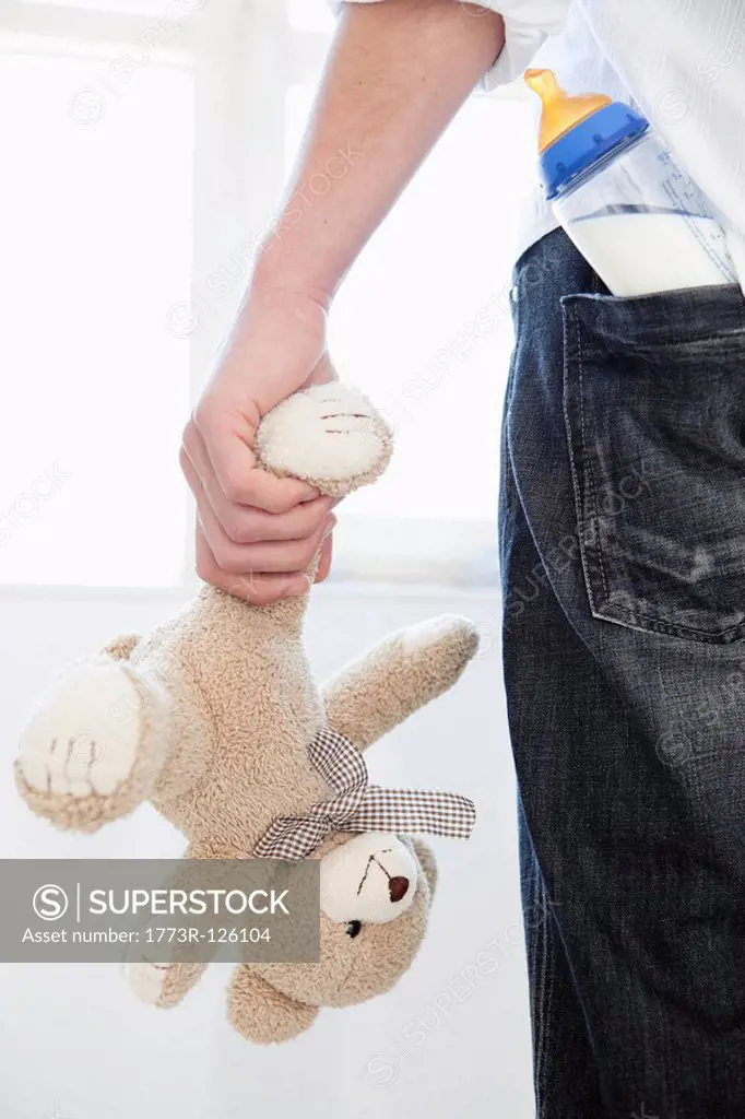 Man holding teddy