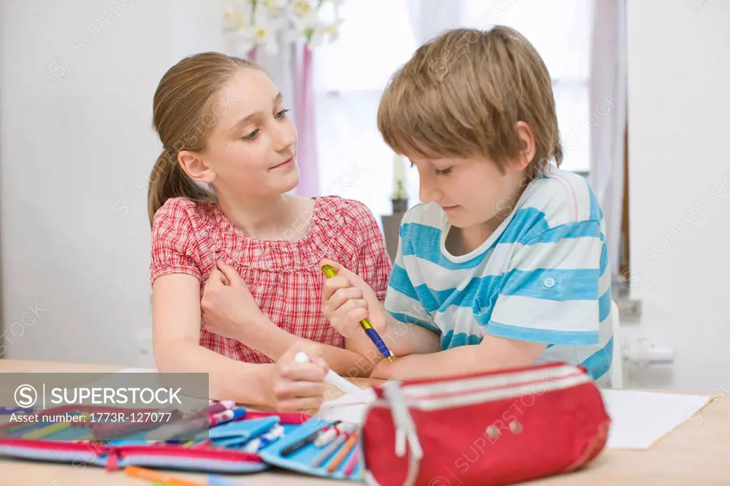 Boy and girl doing homework