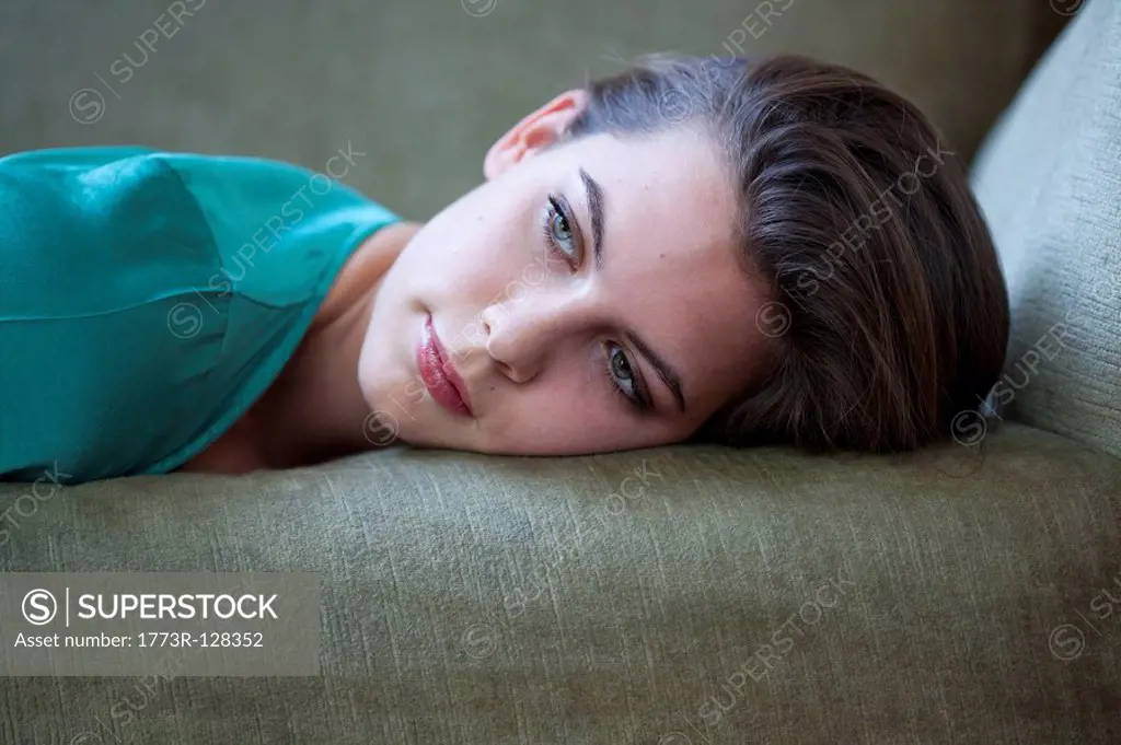 Close up of woman on sofa