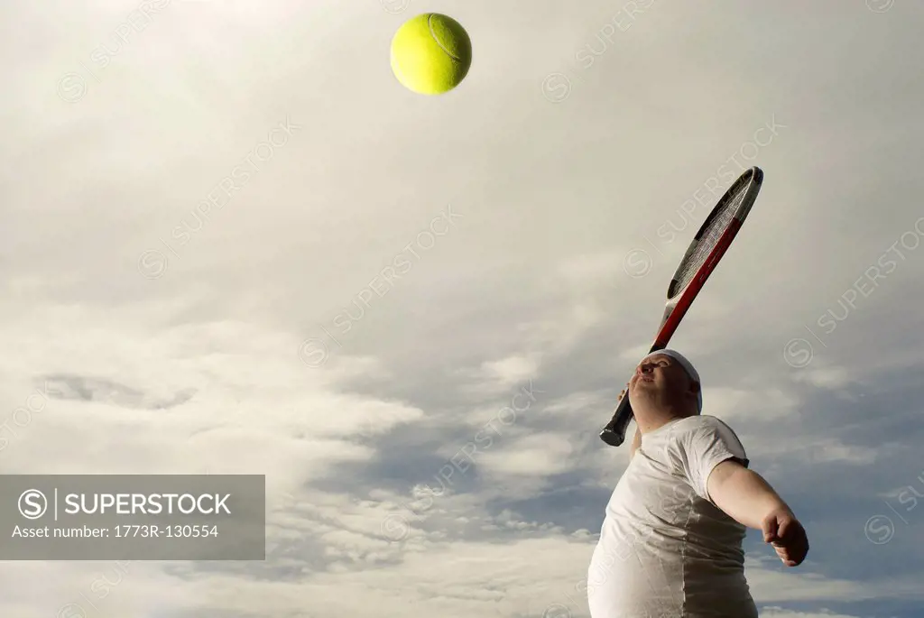 Large tennis player with giant racquet