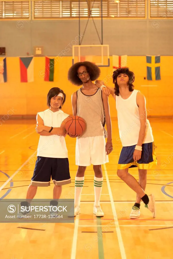 Three basketball players