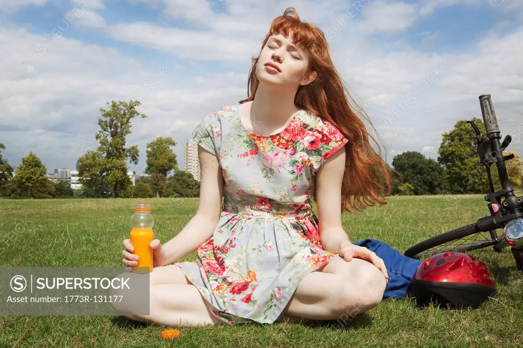 Woman relaxing in park