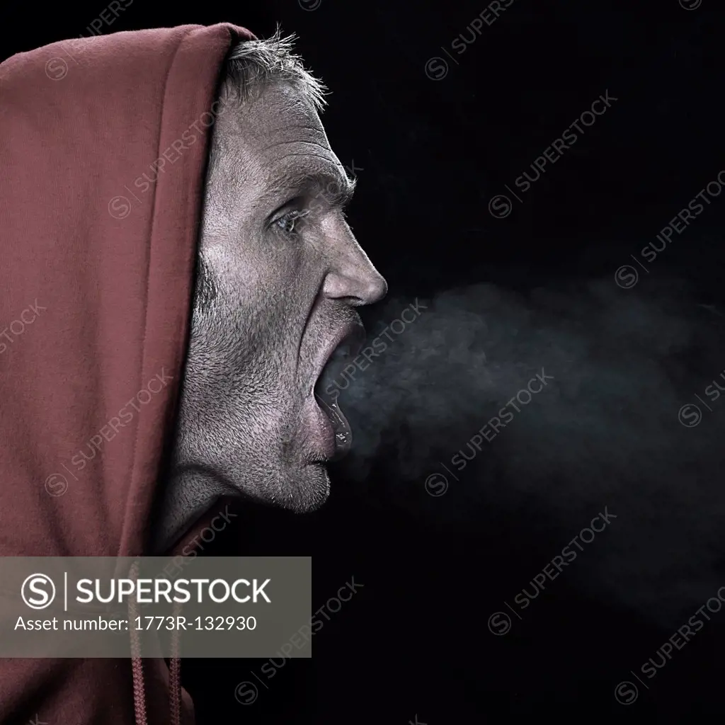 Man breathing out