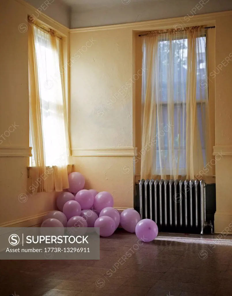 Pink balloons in corner