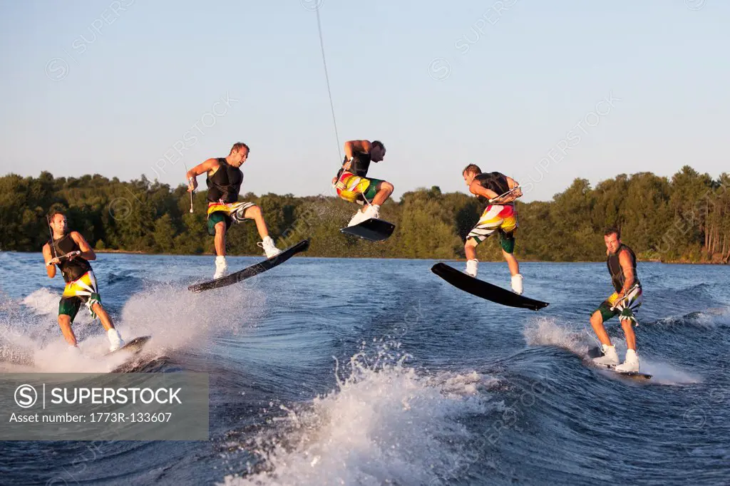 Wakeboarder performing 360 trick