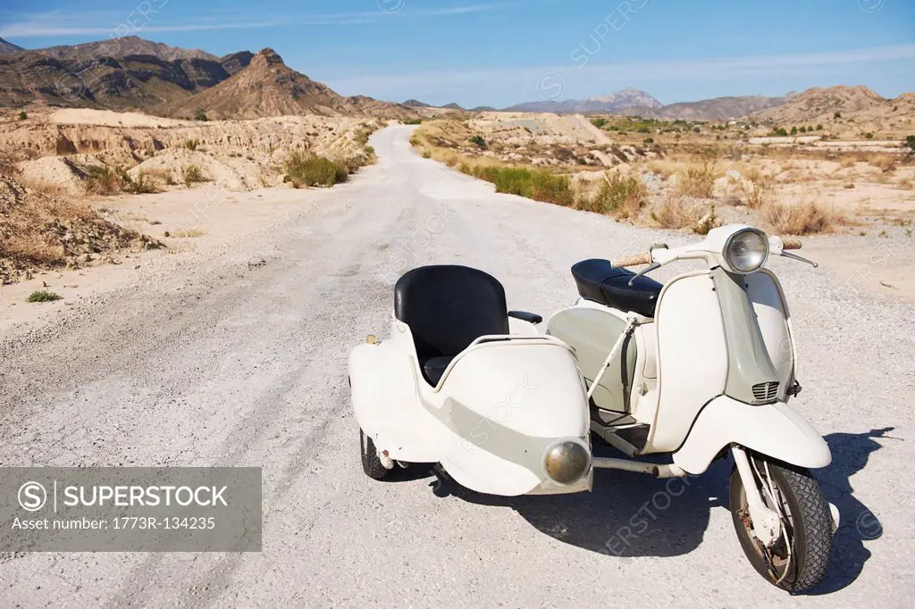 Motorbike and side car on the road