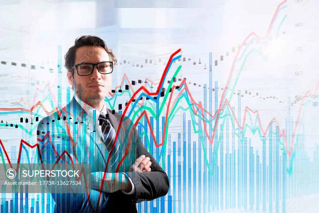 Conceptual image of businessman with graph data
