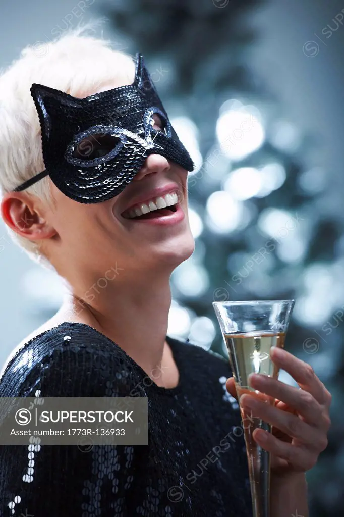 Woman wearing a cat mask