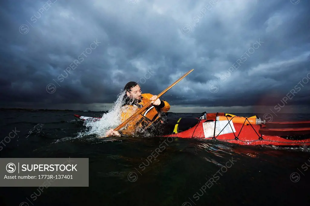 Man in kayak rotating