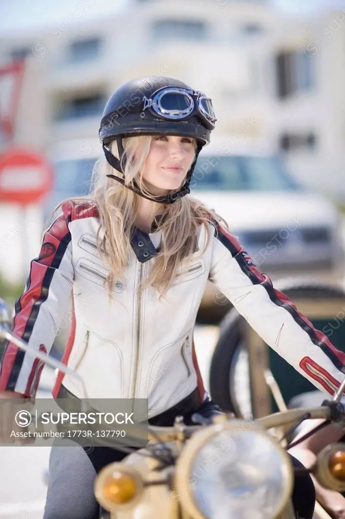 Woman riding a motorbike