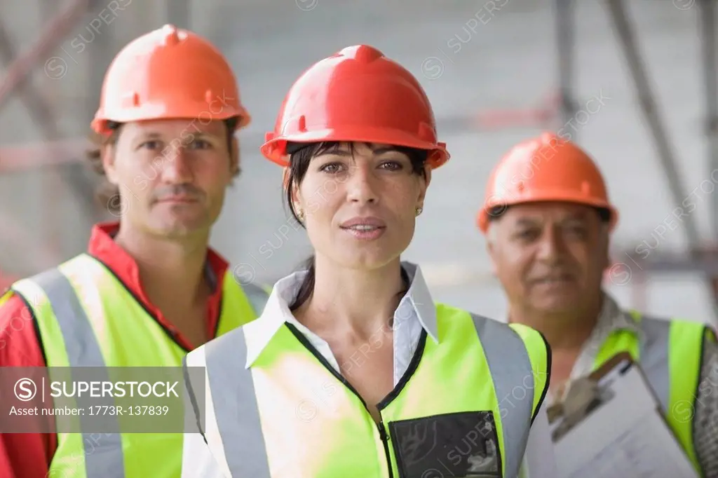 Architect and building workers