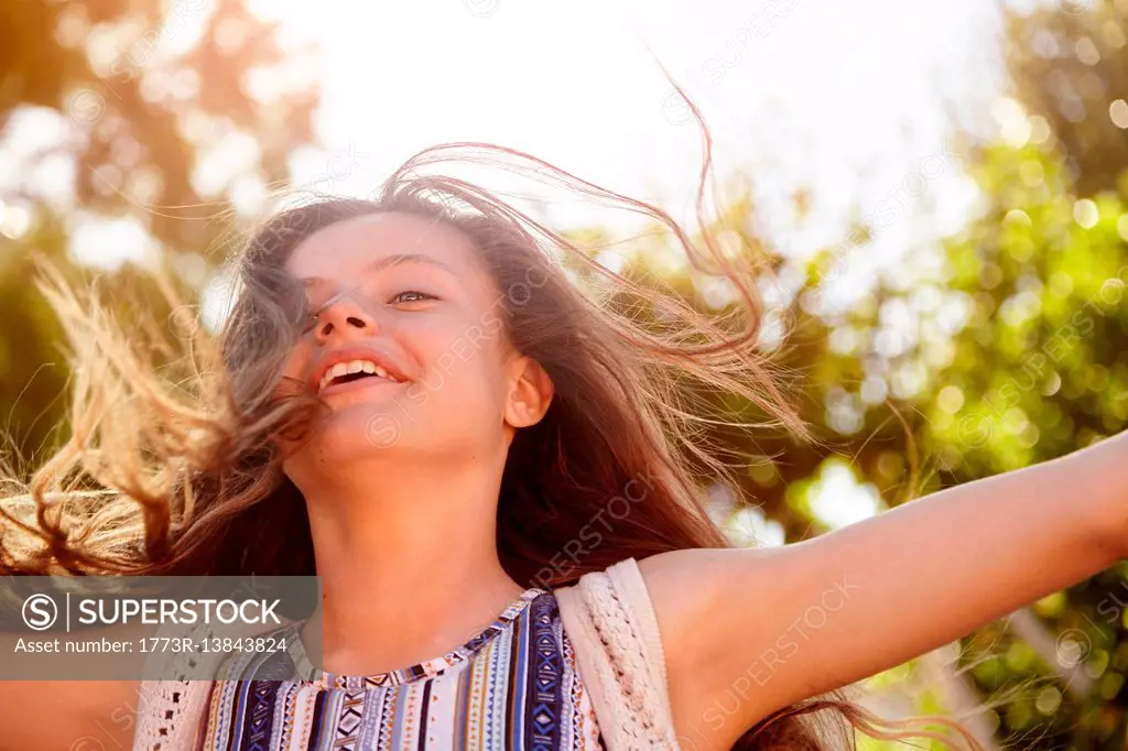 Teenage girl enjoying the breeze