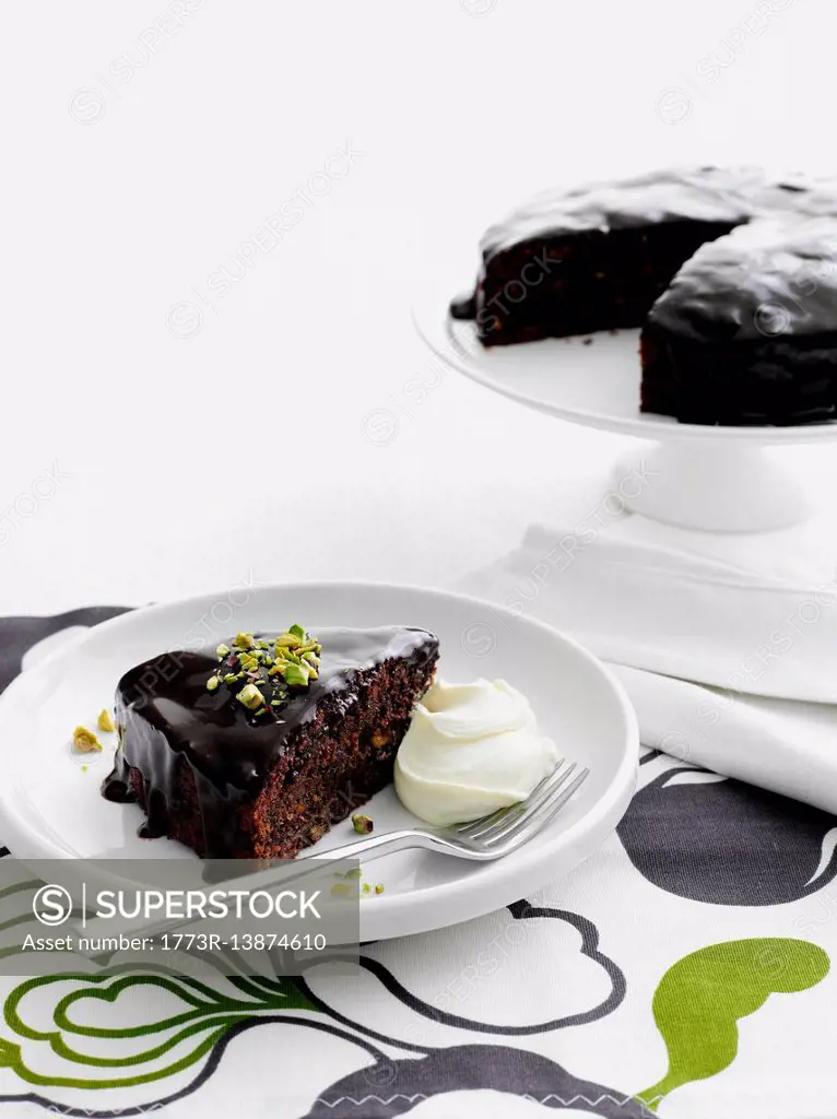 Plate of chocolate cake with cream