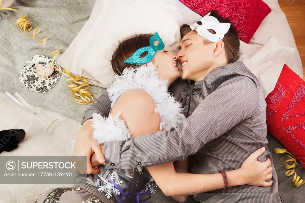 Couple embracing after party