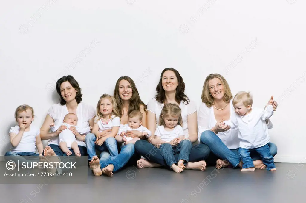 Mothers and children sitting together