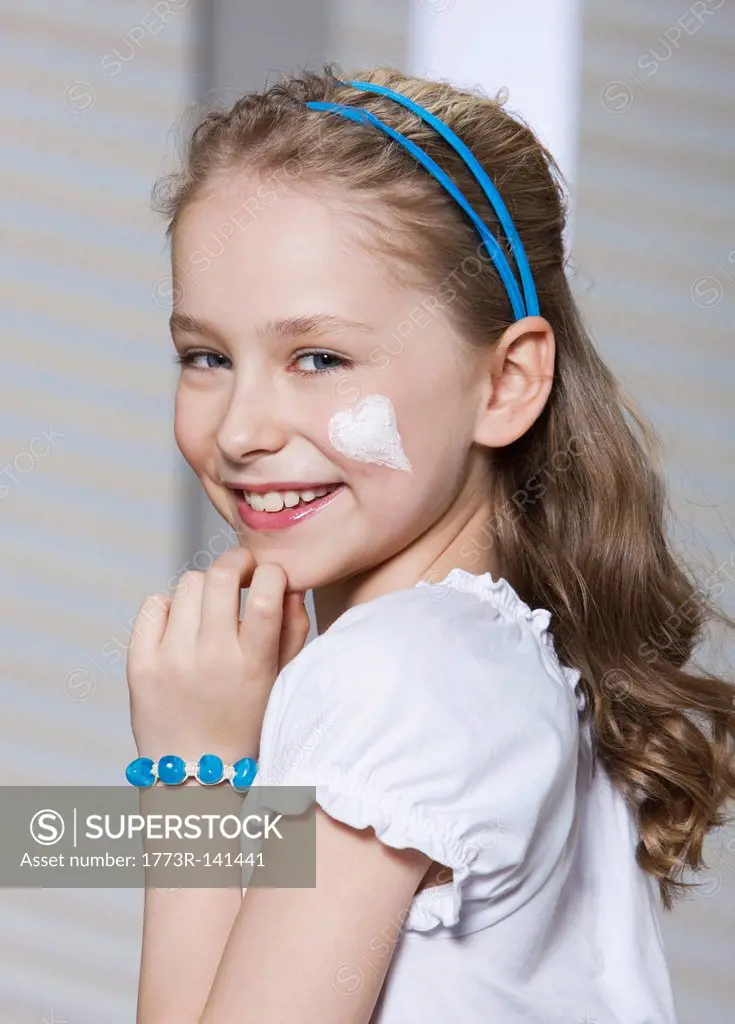 Girl with heart_shaped moisturizer