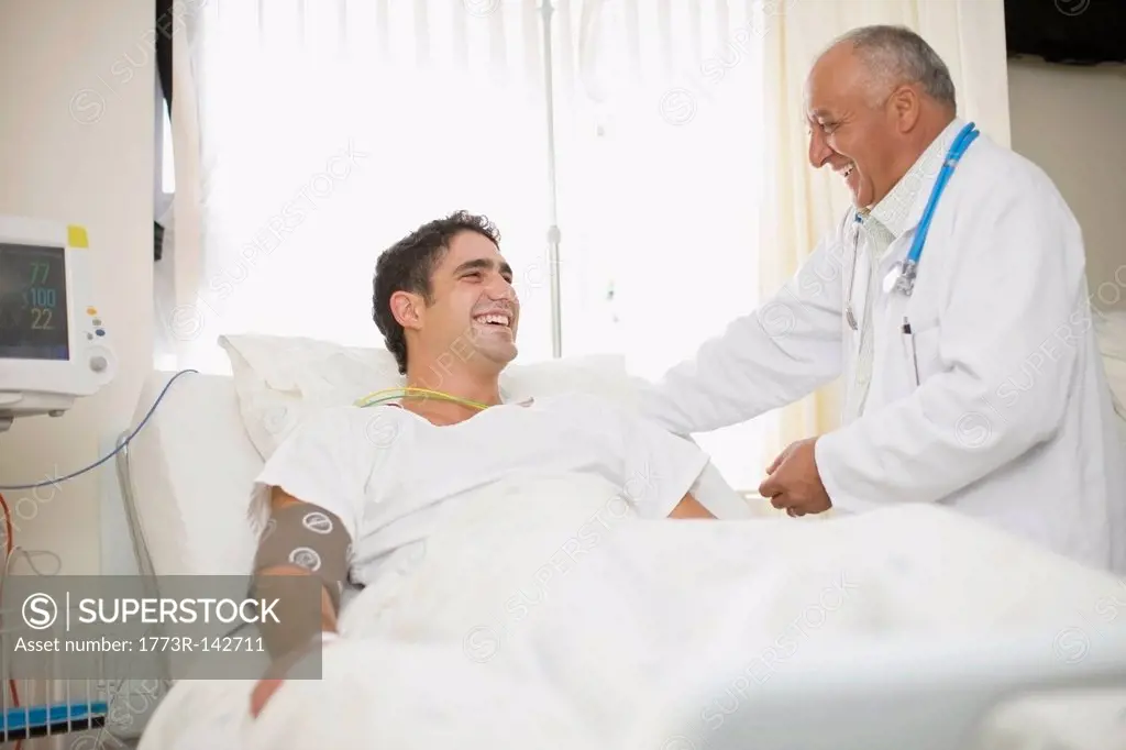 Doctor tending to hospital patient