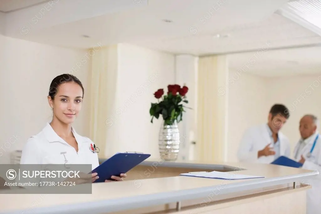 Nurse working at hospital reception