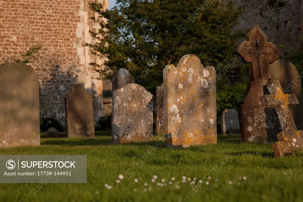 Old headstones in church graveyard