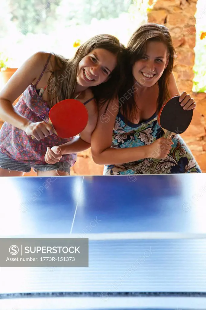 Women playing table tennis