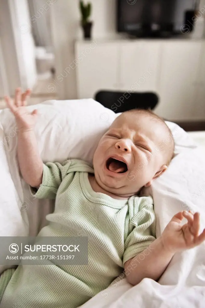 Infant crying in bed