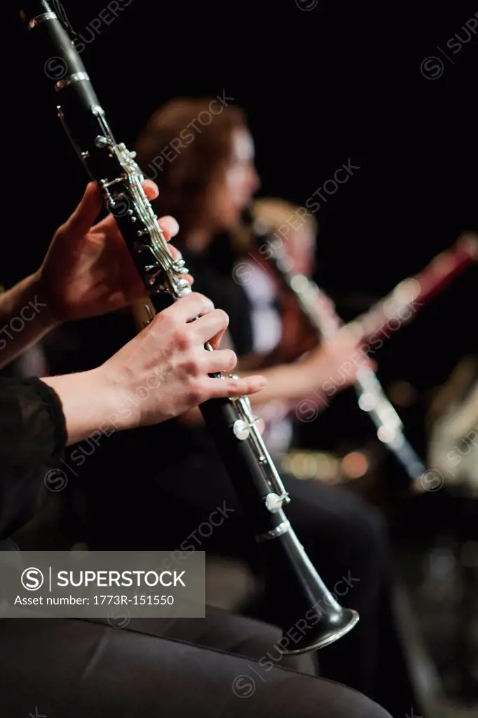 Clarinet player in orchestra