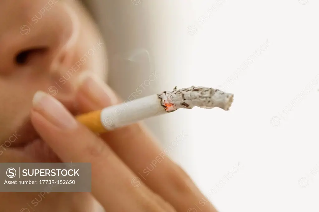 Close up of woman smoking cigarette