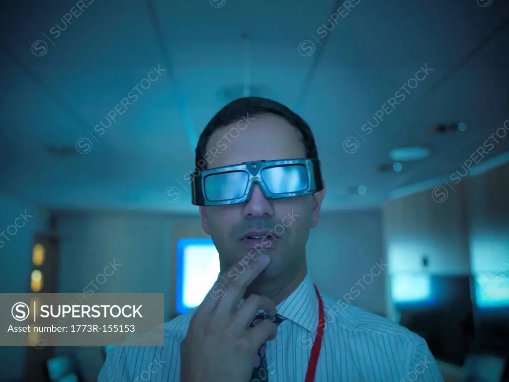 Scientist wearing 3D glasses in lab