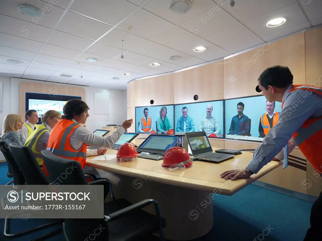 Construction workers in video conference