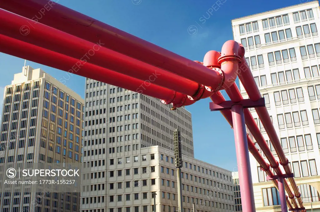 Close up of red pipes in city center