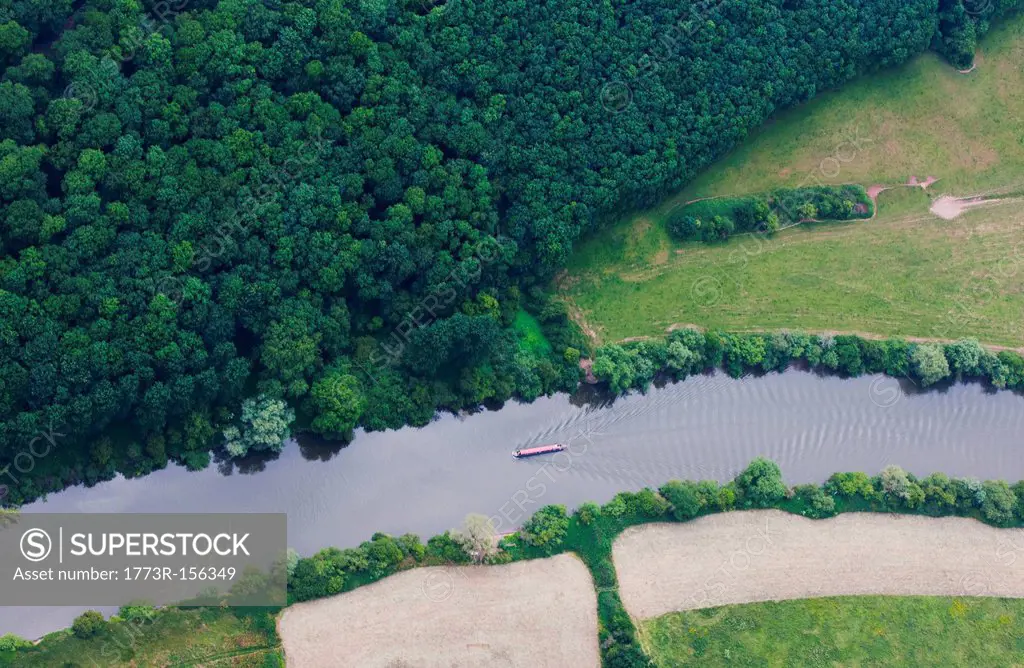 Aerial view of boat in rural river