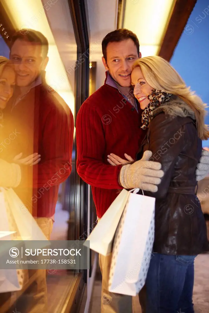 Couple window shopping together