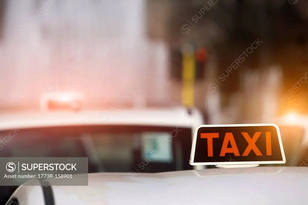 Close up of taxi sign on cab roof