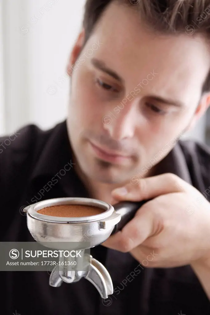Barista using espresso machine