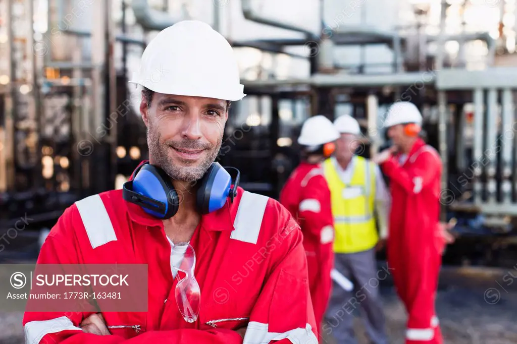 Worker standing at chemical plant
