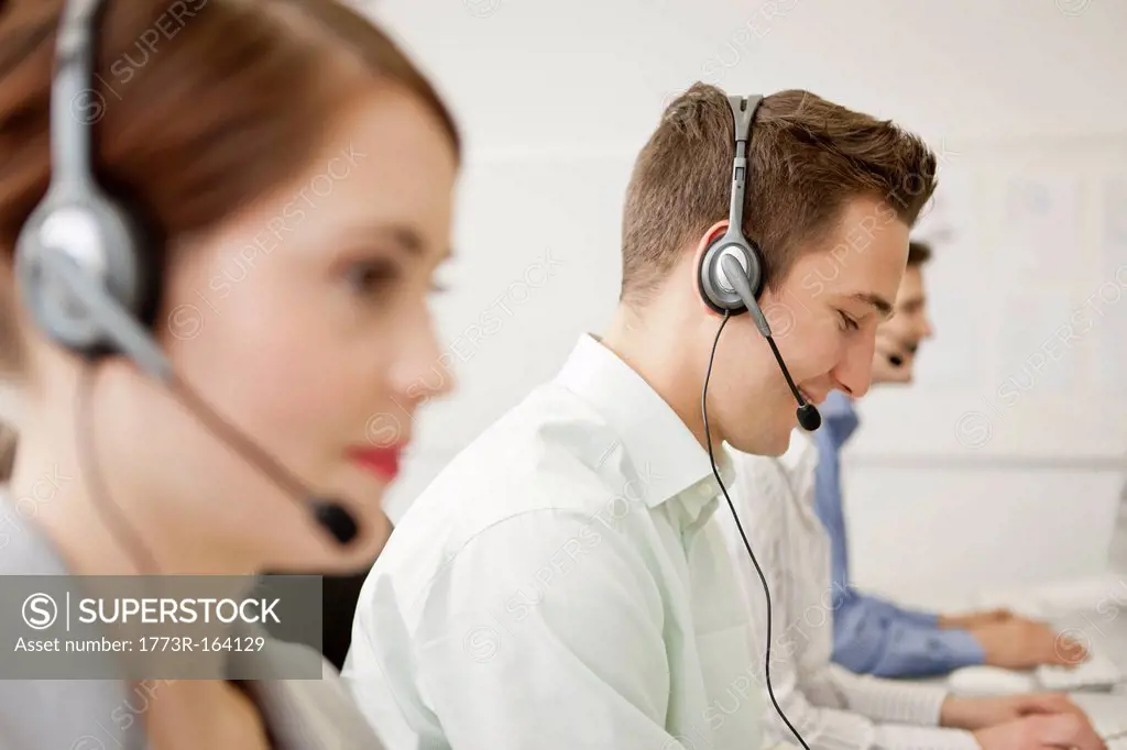 Business people working in headsets