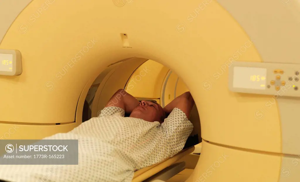 Man relaxing in MRI machine
