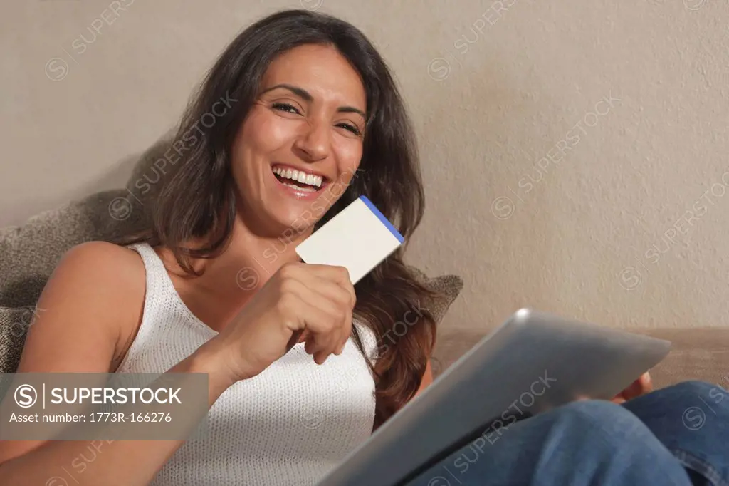 Woman shopping online with tablet