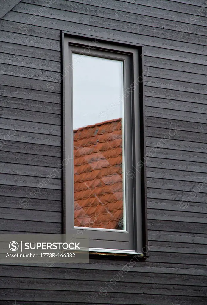Window reflecting roof tiles