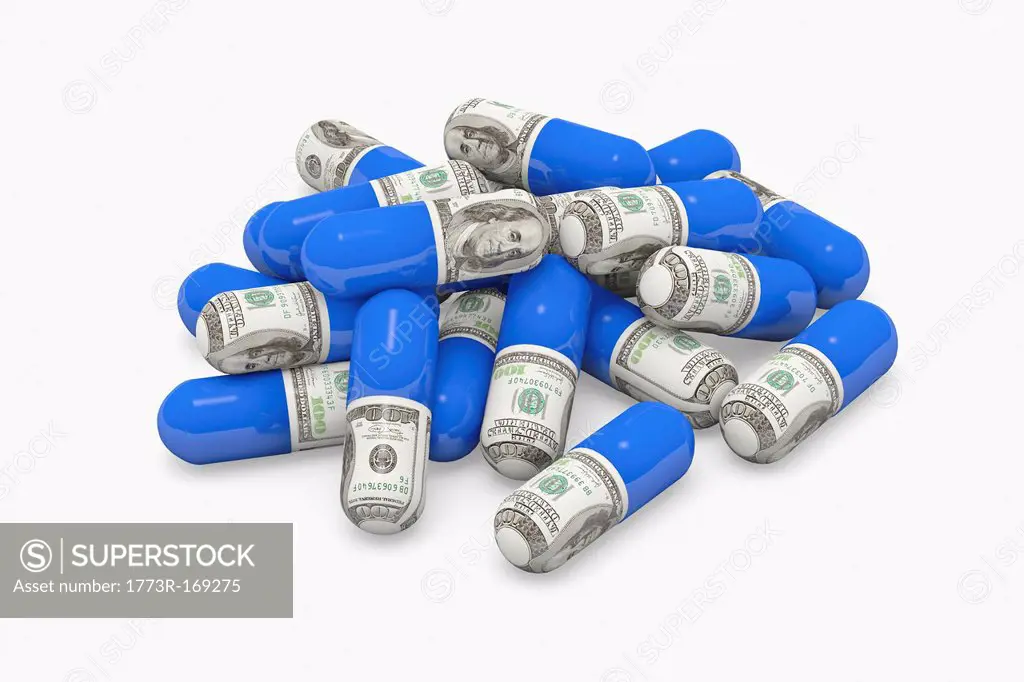 Pills decorated with dollar bills