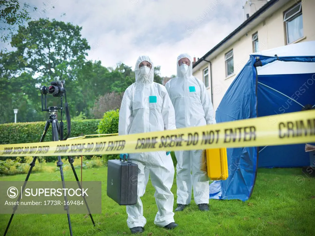 Forensic scientists at crime scene