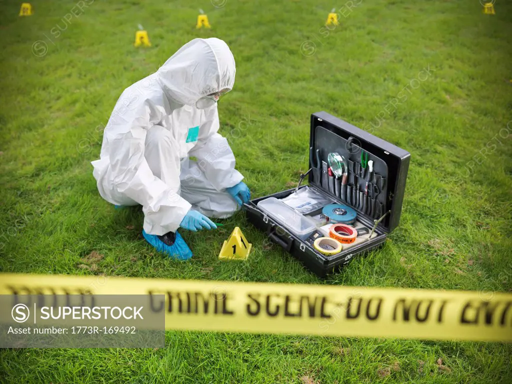 Forensic scientist at crime scene